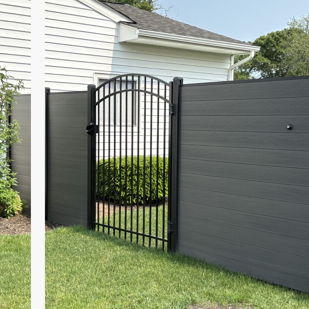 tall fencing with gate on a residential home