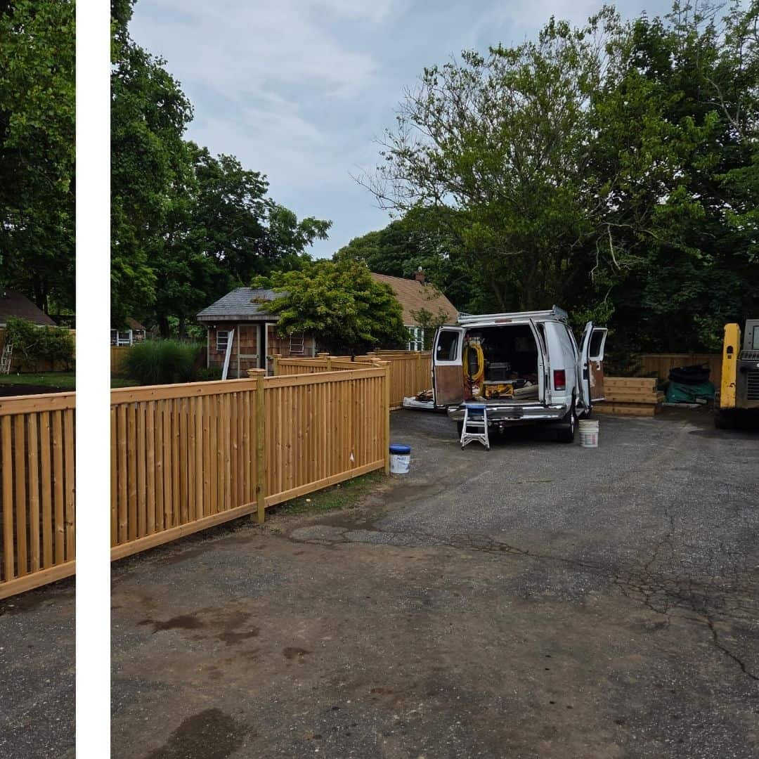 A new wooden privacy fence lines a paved driveway, with a white work van and a house in the background.