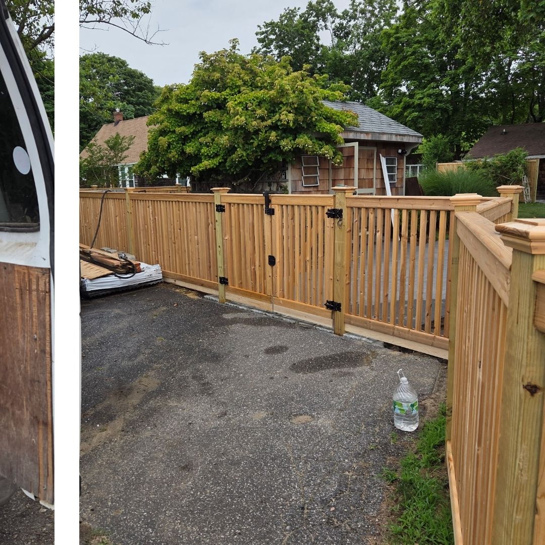 a wooden fence surrounding a house