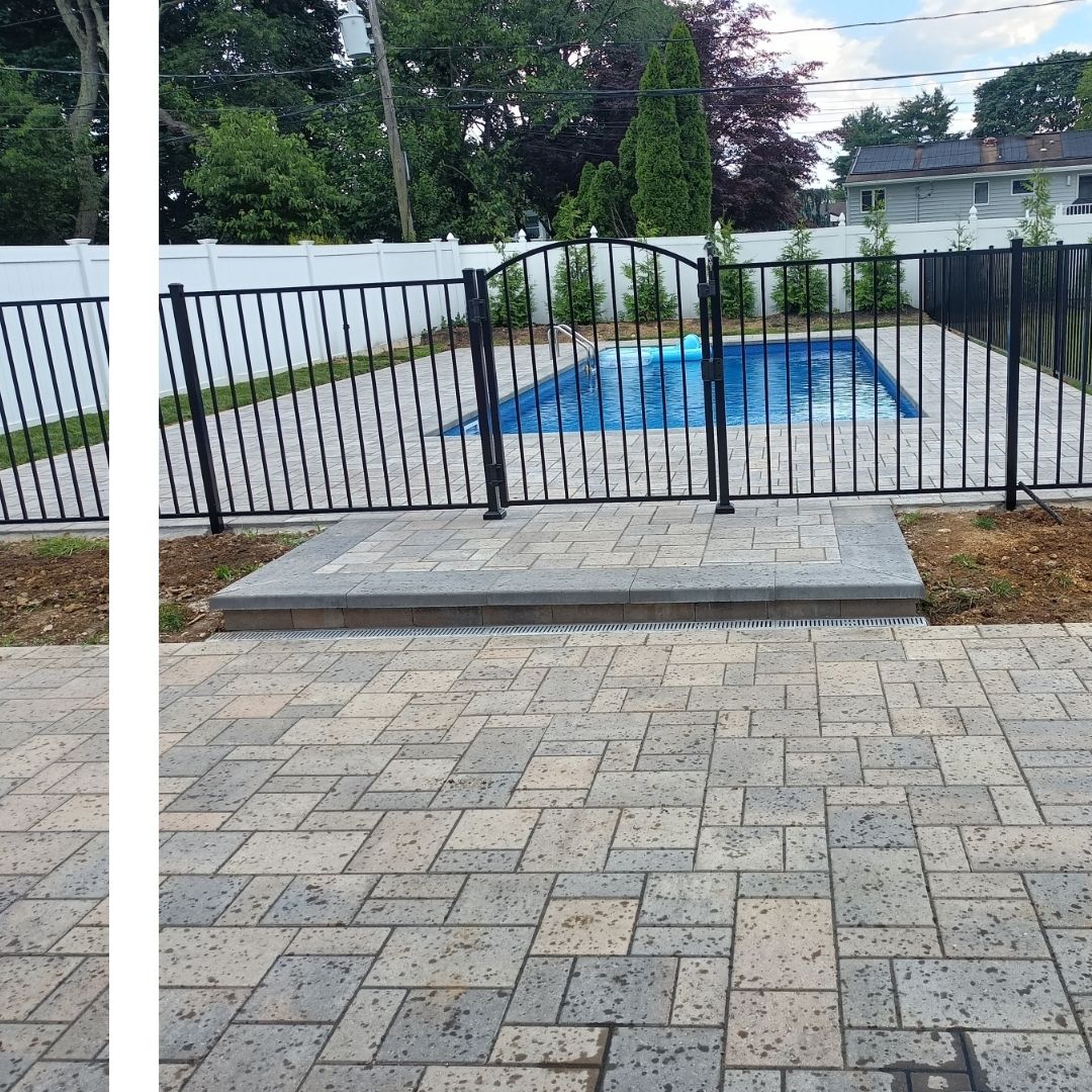 an aluminum fence outside a pool