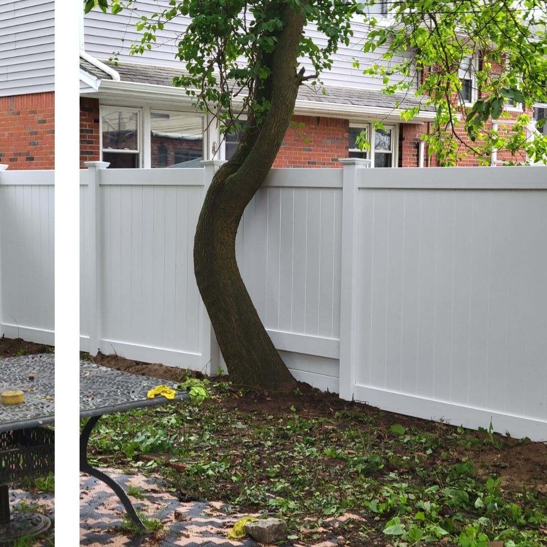 a PVC fence outside of a home