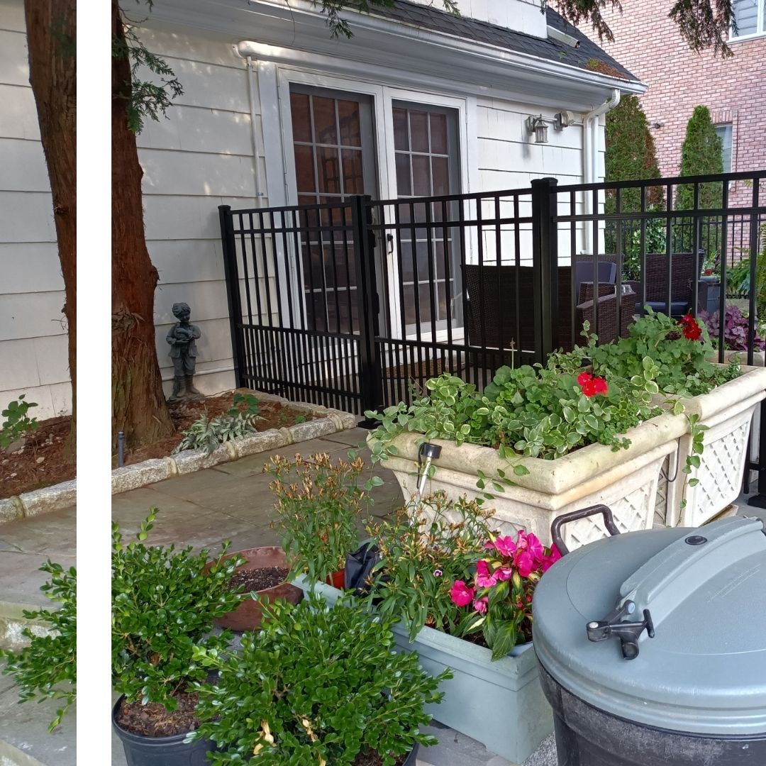 an aluminum fence around a homes backyard