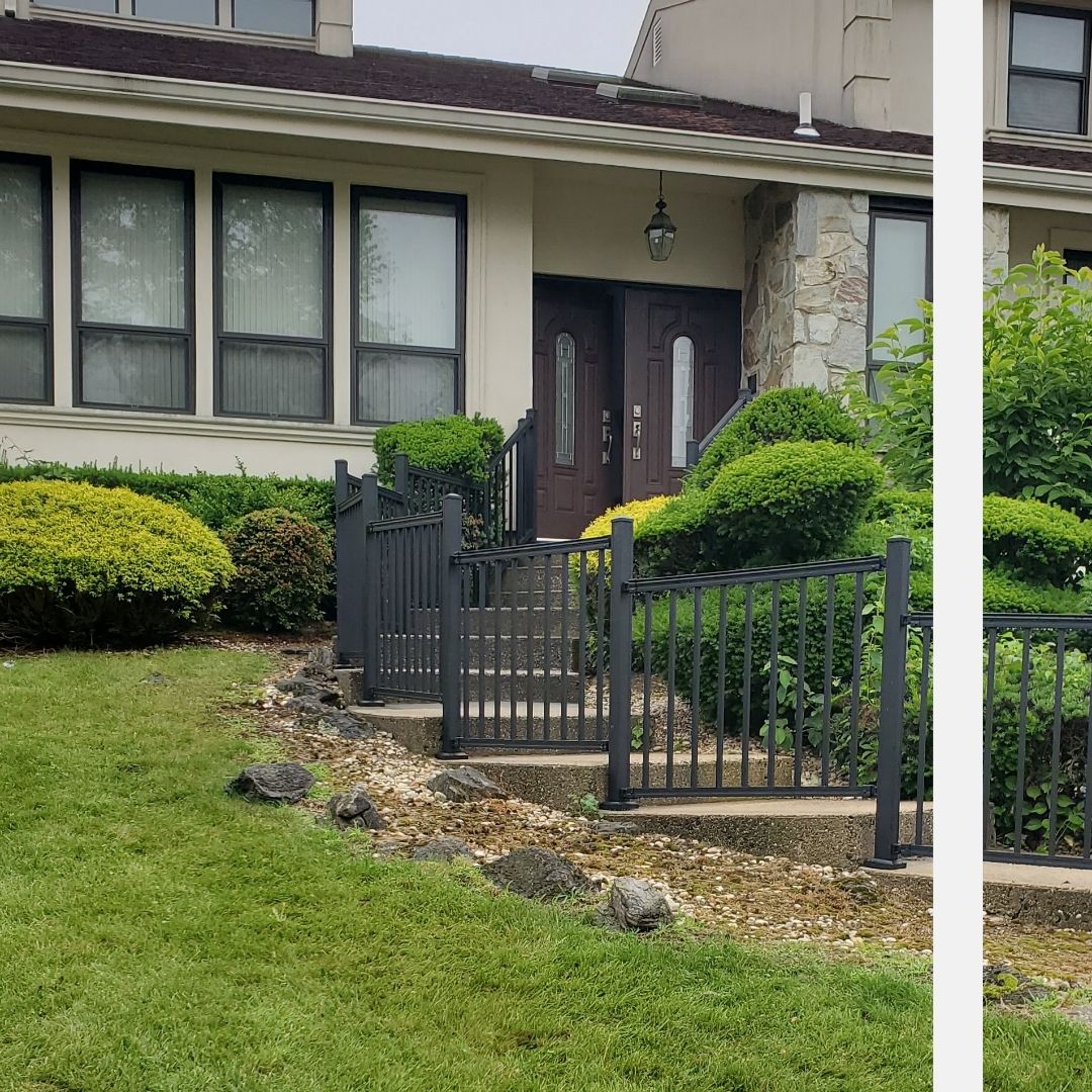 aluminum railing in the front of a home next to stairs