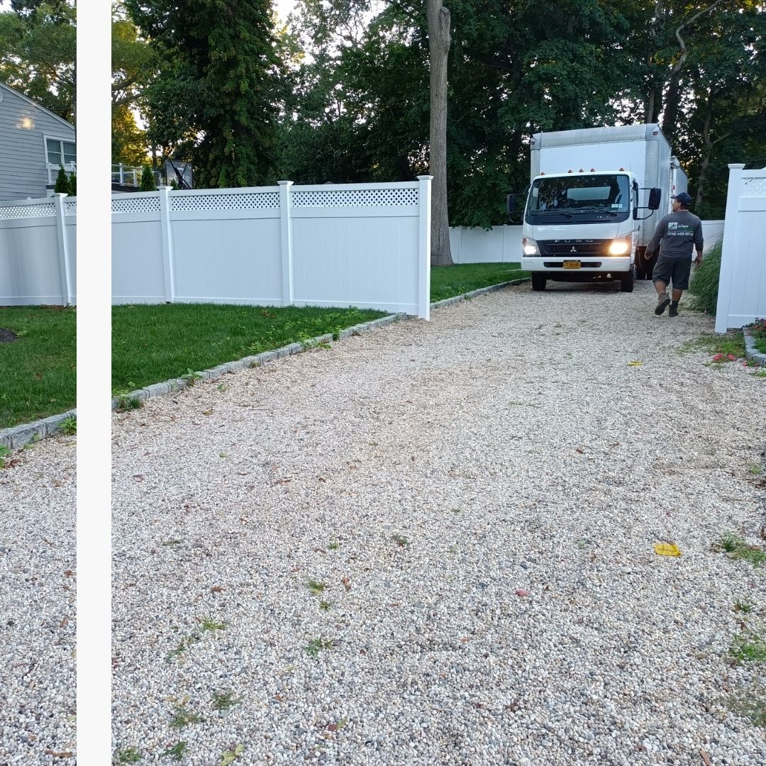 fencing company truck at property