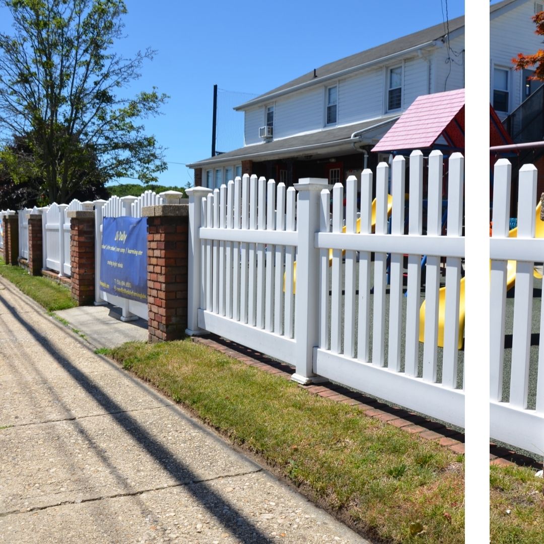 white fence out front of commercial business