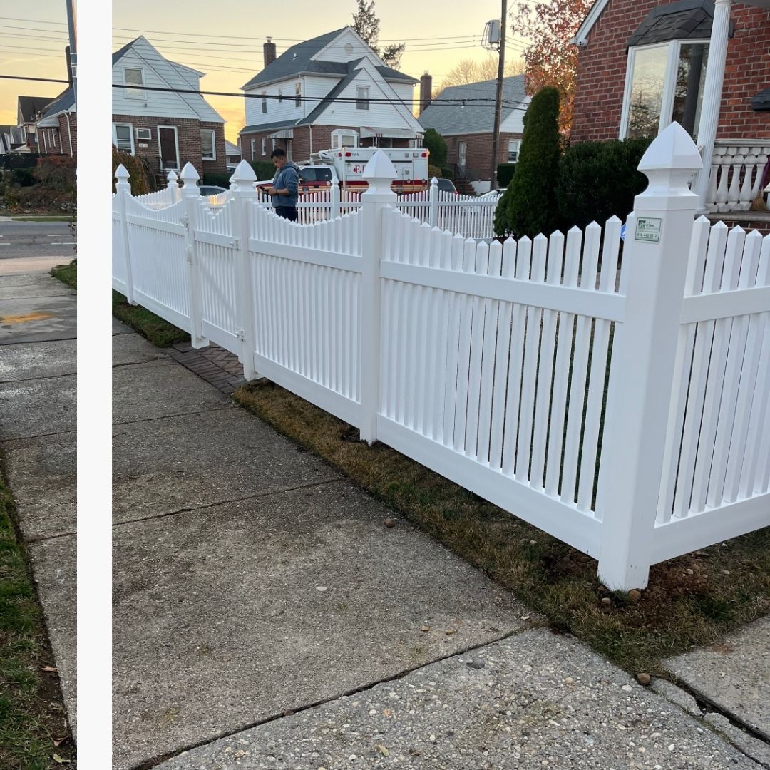 white fence outside home